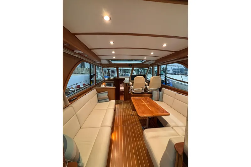 Slide: The Image of Luxurious interior of 2020 Sabre 45 Salon Express yacht with elegant seating and wooden accents. - 28