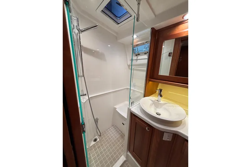 Slide: The Image of Luxurious bathroom in 2020 Sabre 45 Salon Express yacht with modern fixtures. - 43