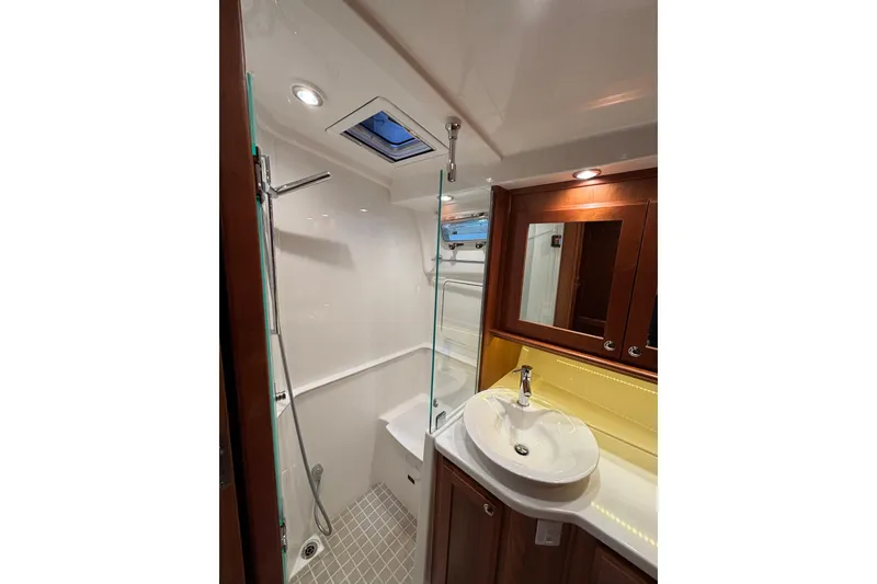 Slide: The Image of Luxurious bathroom in 2020 Sabre 45 Salon Express yacht with modern fixtures and elegant design. - 44