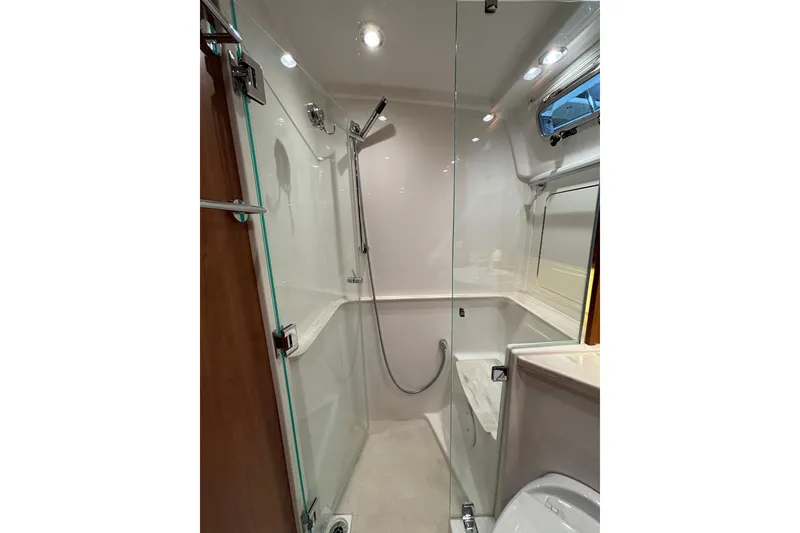 Slide: The Image of Modern shower area in 2020 Sabre 45 Salon Express yacht bathroom. - 57