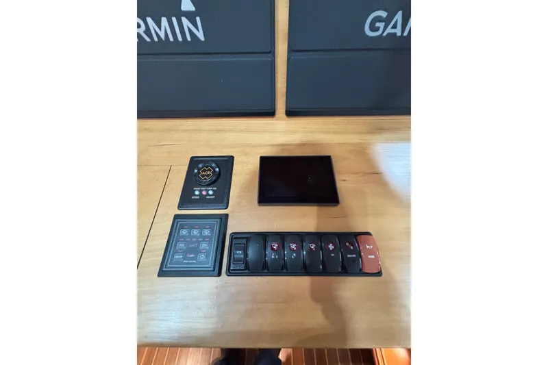 Slide: The Image of Control panel of 2020 Sabre 45 Salon Express with Garmin navigation system. - 77