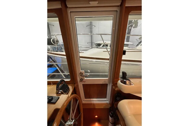 Slide: The Image of Interior view of 2020 Sabre 45 Salon Express yacht helm station. - 82