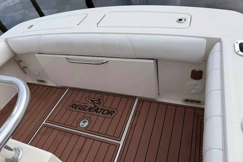 Slide: The Image of Stainless steel rod holders on a 2015 Regulator 25 boat. - 24