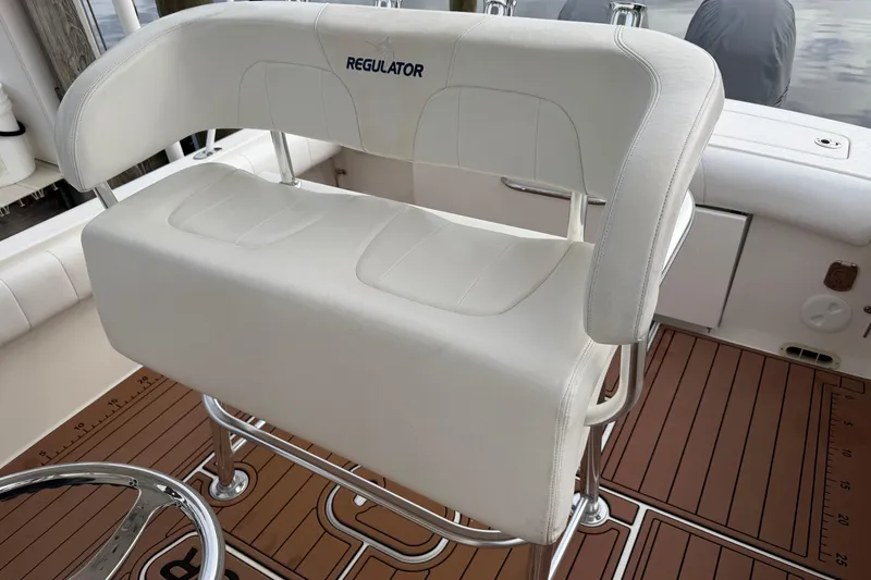 Slide: The Image of Close-up of 2015 Regulator 25 boat's stainless steel T-top structure. - 25