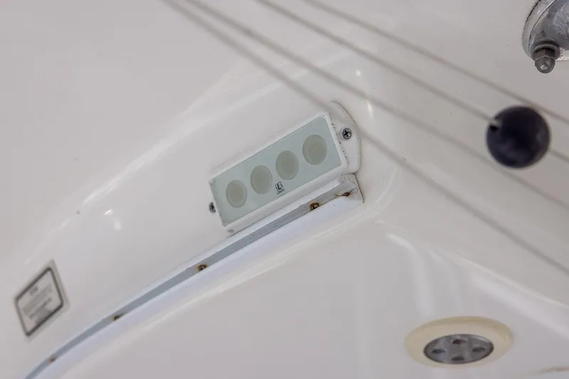 Slide: The Image of 2015 Regulator 25 boat interior detail with control panel and wiring. - 31