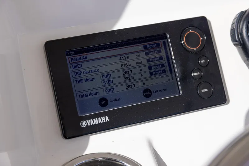 Slide: The Image of Yamaha display showing trip data on a 2015 Regulator 25 boat. - 32
