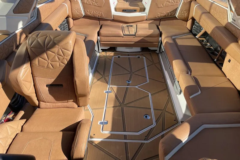 Slide: The Image of Luxurious interior of 2025 Nautique Super Air Nautique G25 Paragon boat. - 12