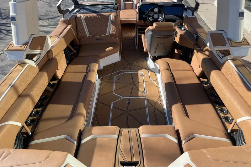 Slide: The Image of Luxurious interior of 2025 Nautique Super Air Nautique G25 Paragon boat. - 5