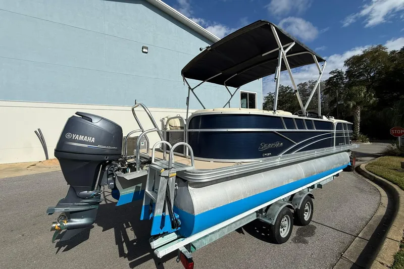 Slide: The Image of 2013 Silver Wave 220 Island CL pontoon boat with Yamaha outboard motor on trailer. - 3