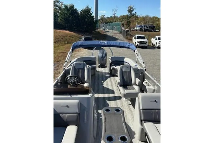 Slide: The Image of 2025 Bennington 22SXSR pontoon boat with spacious seating and modern design. - 14
