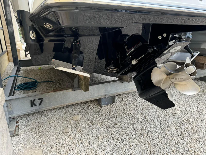 Slide: The Image of 2022 Monterey 278 Super Sport boat propeller and stern on a trailer. - 46