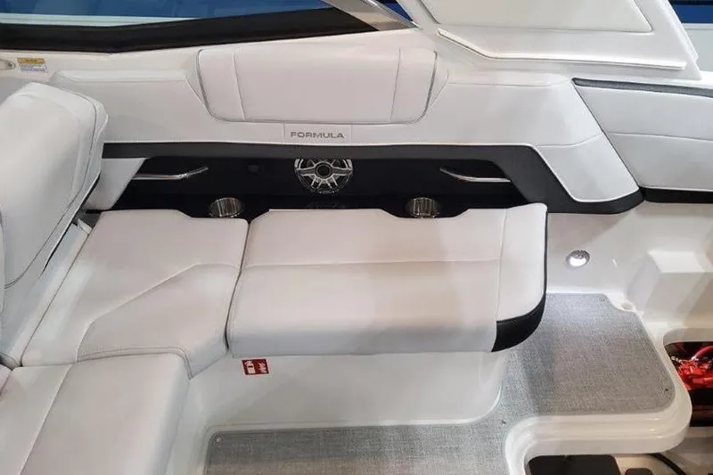 Slide: The Image of Interior of 2025 Formula 330 Crossover Bowrider I/O with white seating. - 10