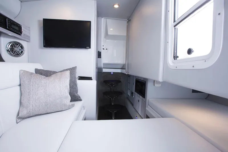 Slide: The Image of Manufacturer Provided Image: Interior of 2025 Formula 330 Crossover Bowrider I/O, featuring modern seating and entertainment system. - 6
