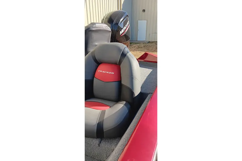 Slide: The Image of 2025 Tracker Pro Team 175 boat seat with Mercury engine in background. - 17