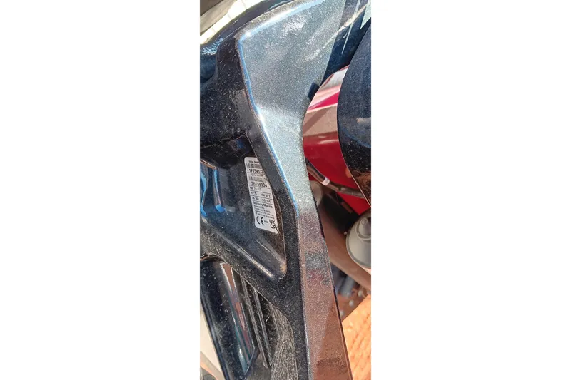 Slide: The Image of Close-up of a 2025 Tracker Pro Team 175 boat component with a visible label. - 23