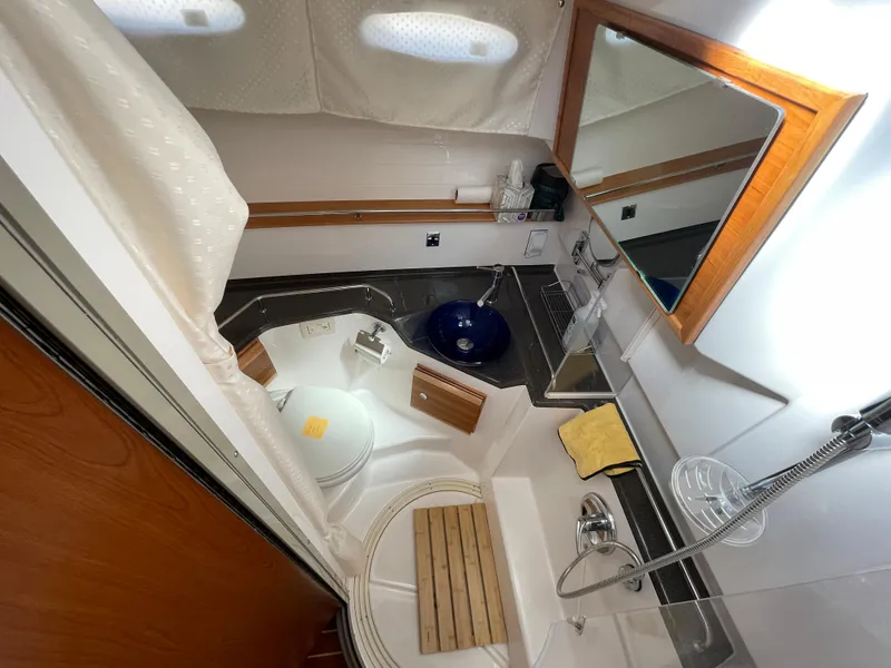 Slide: The Image of Interior view of a 2019 Cutwater C-30 Sedan yacht bathroom. - 11