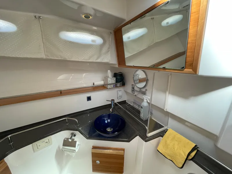Slide: The Image of Interior of 2019 Cutwater C-30 Sedan featuring modern bathroom. - 12