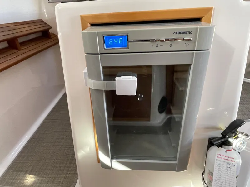 Slide: The Image of Dometic fridge in 2019 Cutwater C-30 Sedan boat. - 24