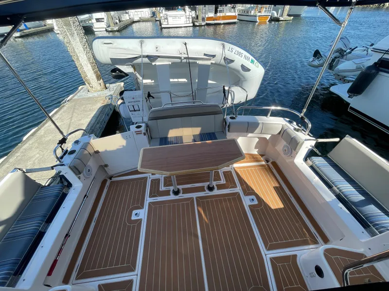Slide: The Image of 2019 Cutwater C-30 Sedan yacht docked with teak deck. - 38