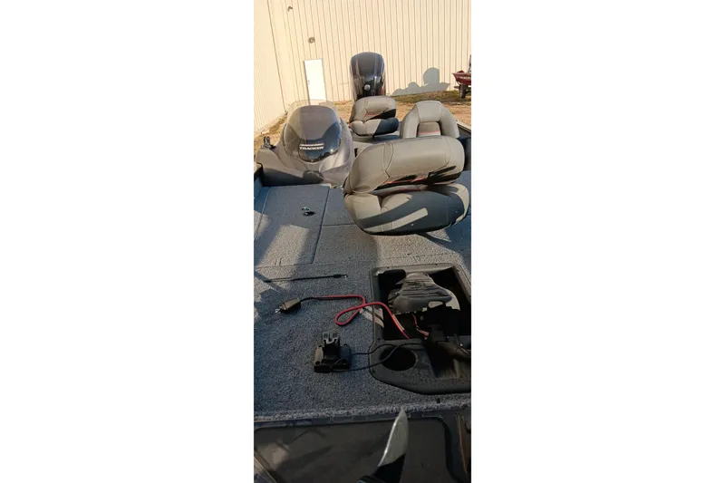 Slide: The Image of 2024 Tracker Pro Team 175 TXW boat interior with seating and equipment. - 11