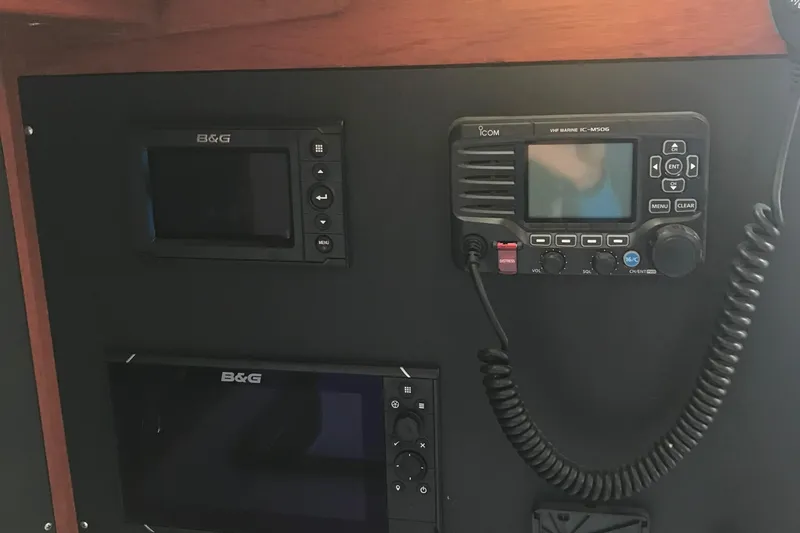 Slide: The Image of Control panel of a 1989 J Boats J/44 with B&G and Icom marine electronics. - 14