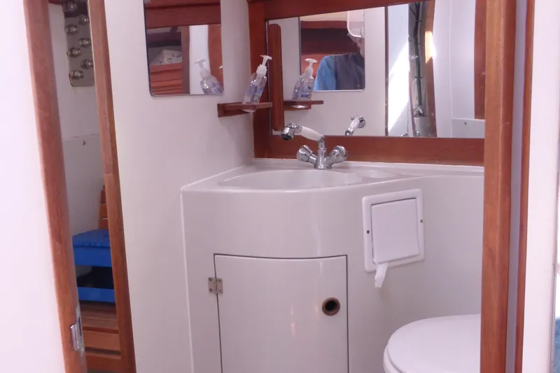 Slide: The Image of Bathroom interior of 1989 J Boats J/44 yacht with sink and mirror. - 26