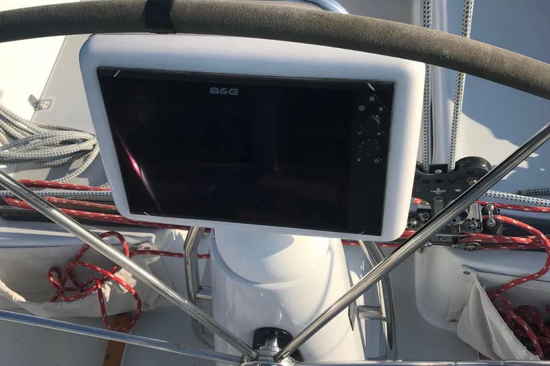 Slide: The Image of Steering wheel and navigation system on 1989 J Boats J/44 sailboat. - 4