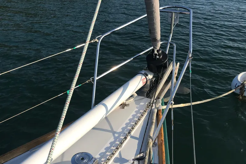 Slide: The Image of Bow of 1989 J Boats J/44 sailboat with rigging and calm water. - 5