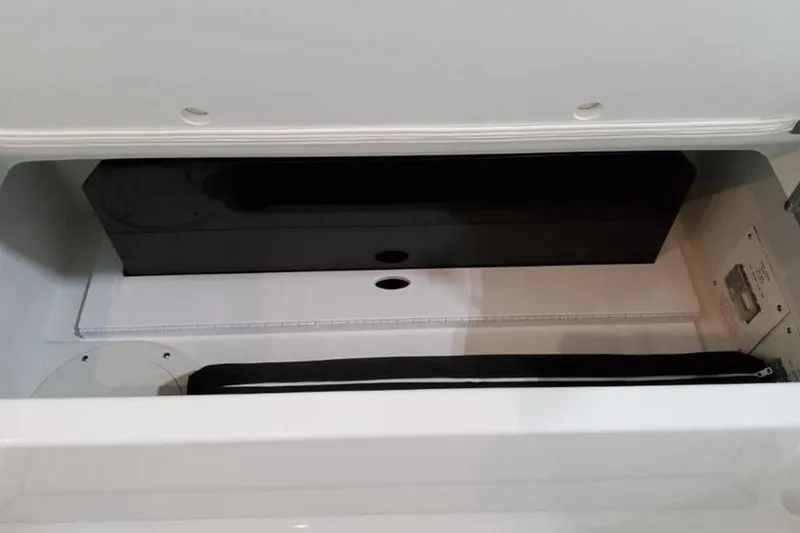 Slide: The Image of Storage compartment of 2026 Formula 360 Crossover Bowrider I/O boat, featuring sleek design. - 13