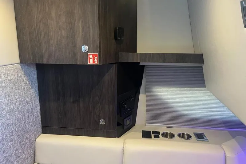 Slide: The Image of Interior of 2026 Formula 360 Crossover Bowrider I/O with modern cabinetry and seating. - 15
