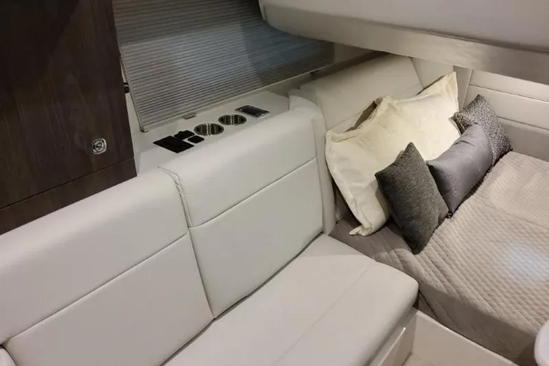 Slide: The Image of Luxurious interior of 2026 Formula 360 Crossover Bowrider I/O with plush seating and bedding. - 9