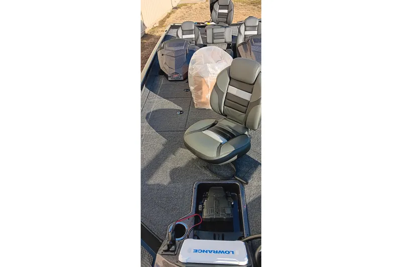 Slide: The Image of 2026 Ranger RT198P boat interior with seating and equipment. - 16