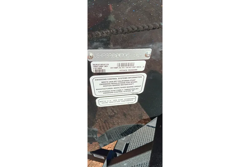 Slide: The Image of 2026 Ranger RT198P emissions control label on boat transom. - 24