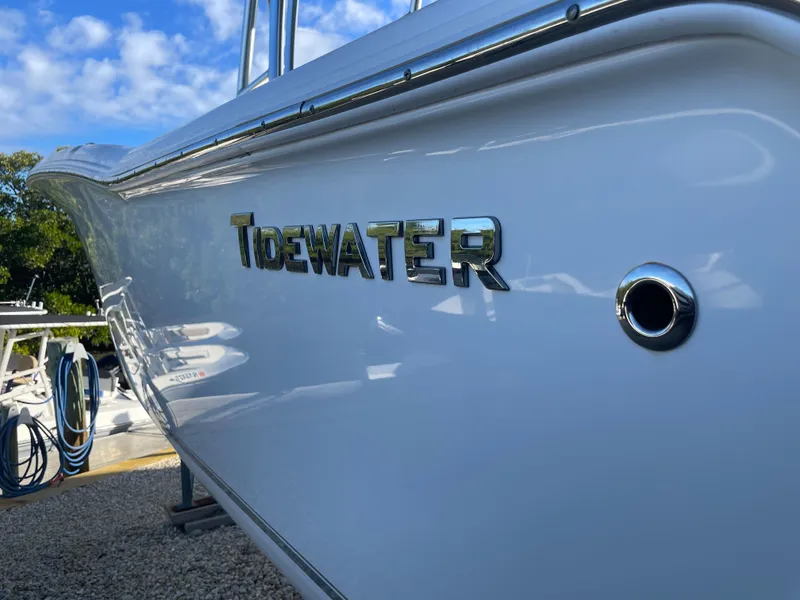 Slide: The Image of 2017 Tidewater 220 boat, close-up of name on hull. - 11