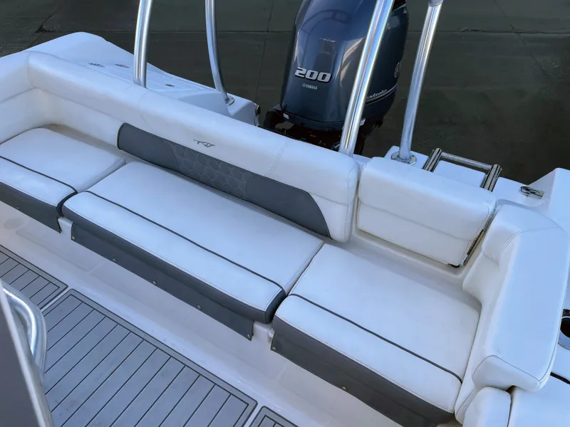 Slide: The Image of Tidewater 220 boat 2017 with Yamaha 200 engine and white seating area. - 18