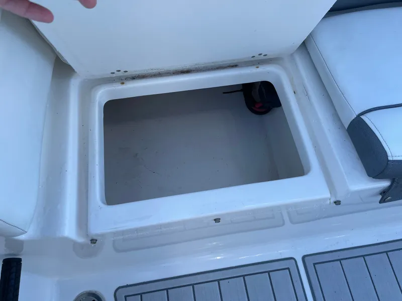 Slide: The Image of Open storage compartment on a 2017 Tidewater 220 boat. - 20