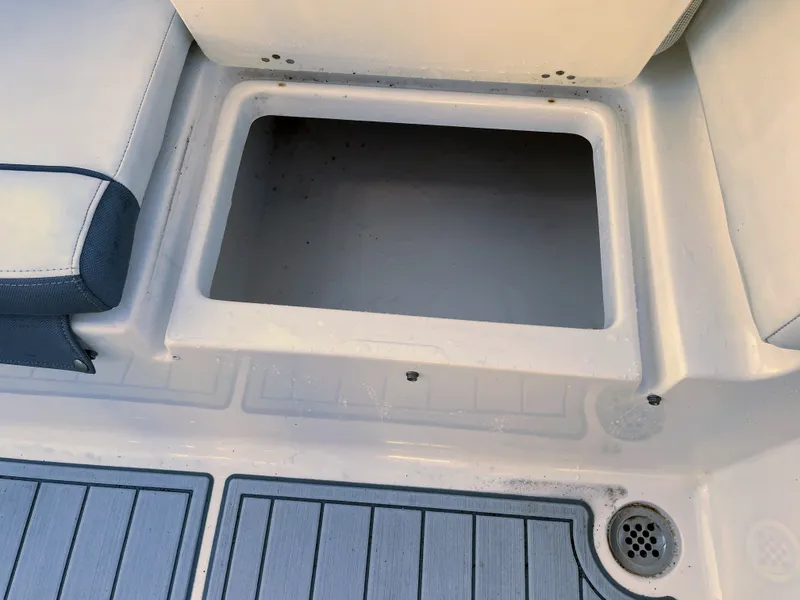 Slide: The Image of Tidewater 220 boat 2017, seating area with storage compartment. - 21
