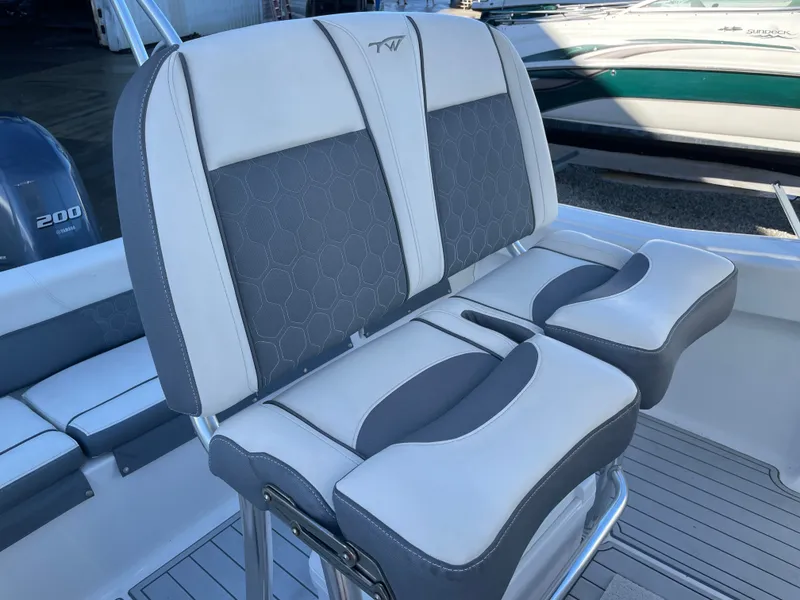 Slide: The Image of Tidewater 220 boat seats, gray and white, year 2017. - 38