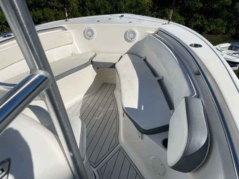 Slide: The Image of Interior of a 2017 Tidewater 220 boat with gray seating. - 44