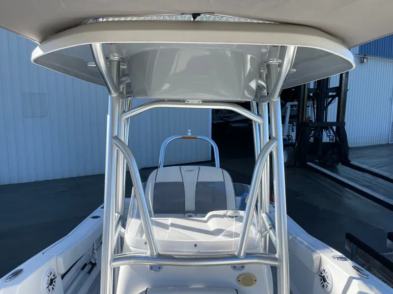 Slide: The Image of 2017 Tidewater 220 boat with T-top and seating area. - 48