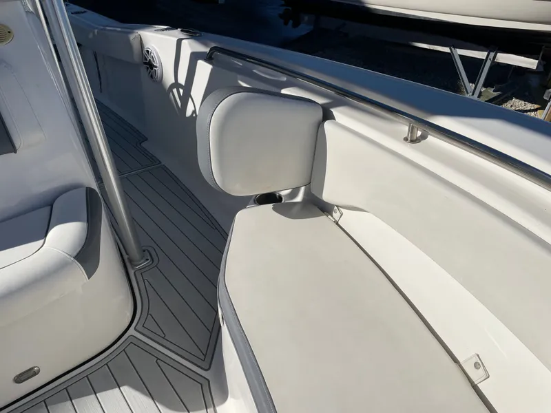 Slide: The Image of Interior of a 2017 Tidewater 220 boat with seating area. - 49