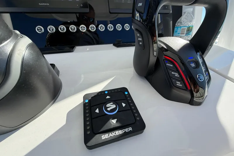 Slide: The Image of Control panel of a 2026 Jupiter 26 boat with Seakeeper and Yamaha controls. - 28