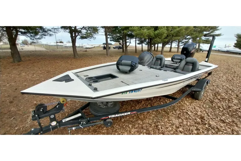 Slide: The Image of 2022 Tracker Pro Team 195 TXW fishing boat on trailer, parked outdoors. - 20