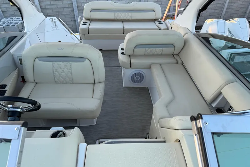 Slide: The Image of 2019 Regal 33 OBX boat interior with luxurious beige seating and modern design. - 15