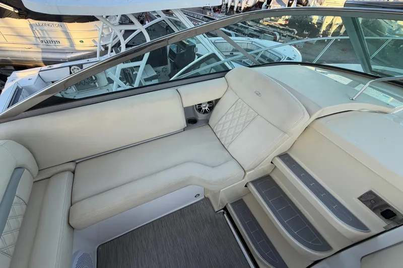 Slide: The Image of Luxurious interior seating of a 2019 Regal 33 OBX boat with elegant upholstery. - 38