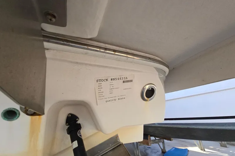Slide: The Image of 2019 Regal 33 OBX boat detail with stock number and label. - 7