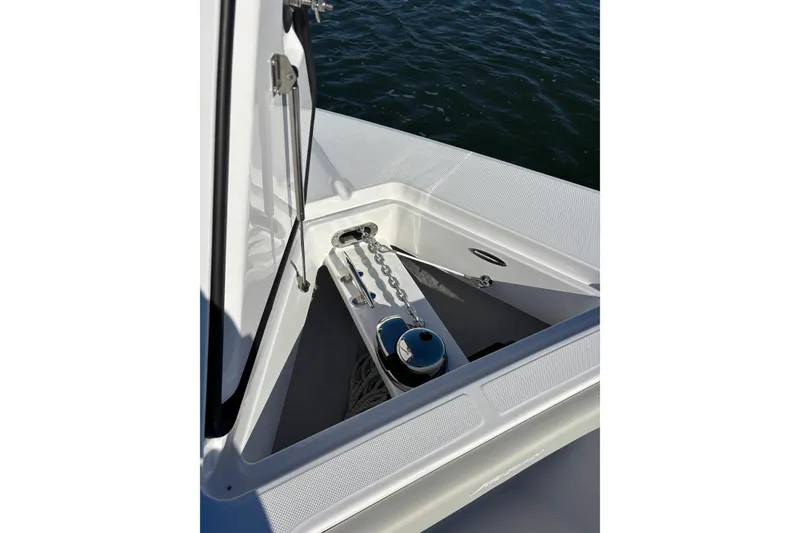 Slide: The Image of Anchor compartment of 2026 Jupiter 32 boat with chain and winch. - 33