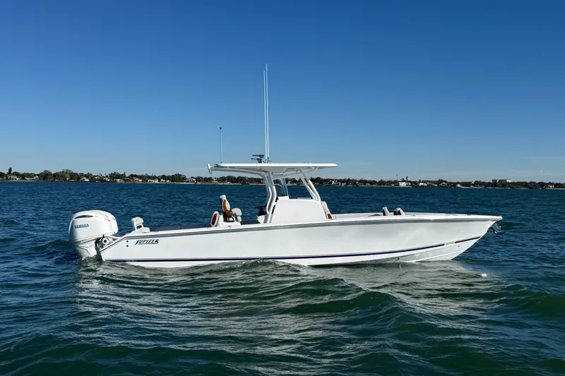The Image of 2026 Jupiter 32 boat on open water, featuring sleek design and Yamaha engine. - 8