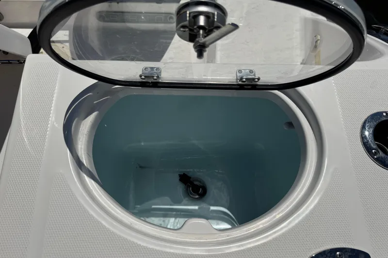 Slide: The Image of Open livewell on 2022 Robalo R242 Center Console boat. - 22