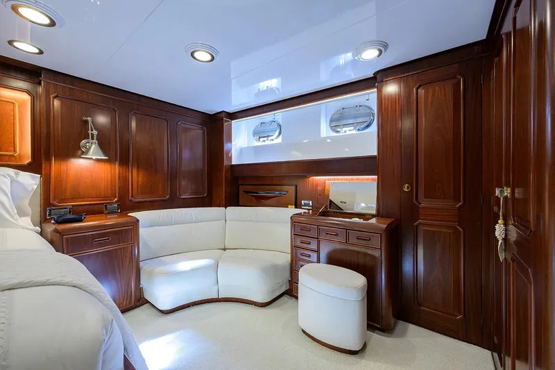 Slide: The Image of Luxurious wood-paneled cabin interior of 1986 Jongert 85 yacht with elegant furnishings. - 23